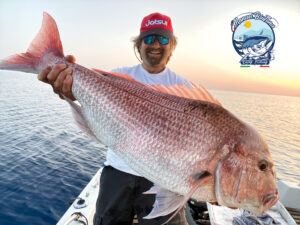 Manuel Carillo Pescatore in Barca con un pesce